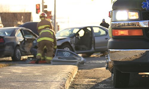 Firefighters Working At a Car Accident