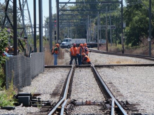 railroad workers on a train track